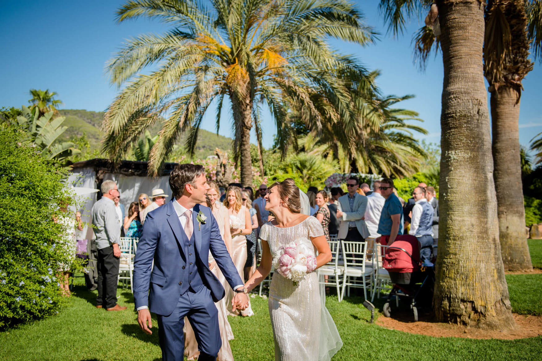 bride groom singing just married garden wedding ceremony palm trees