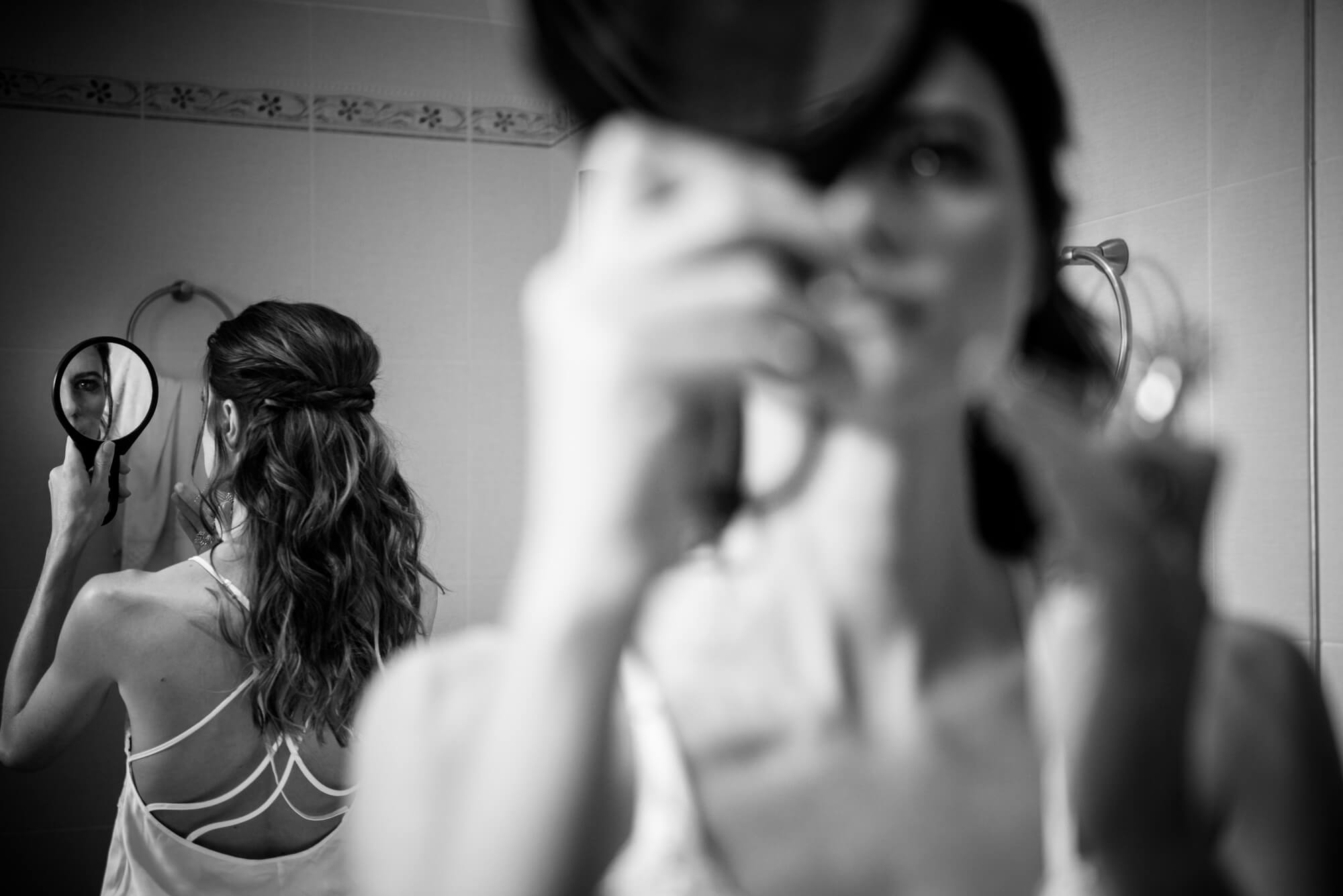 bride getting ready make up mirror black white documentry photo
