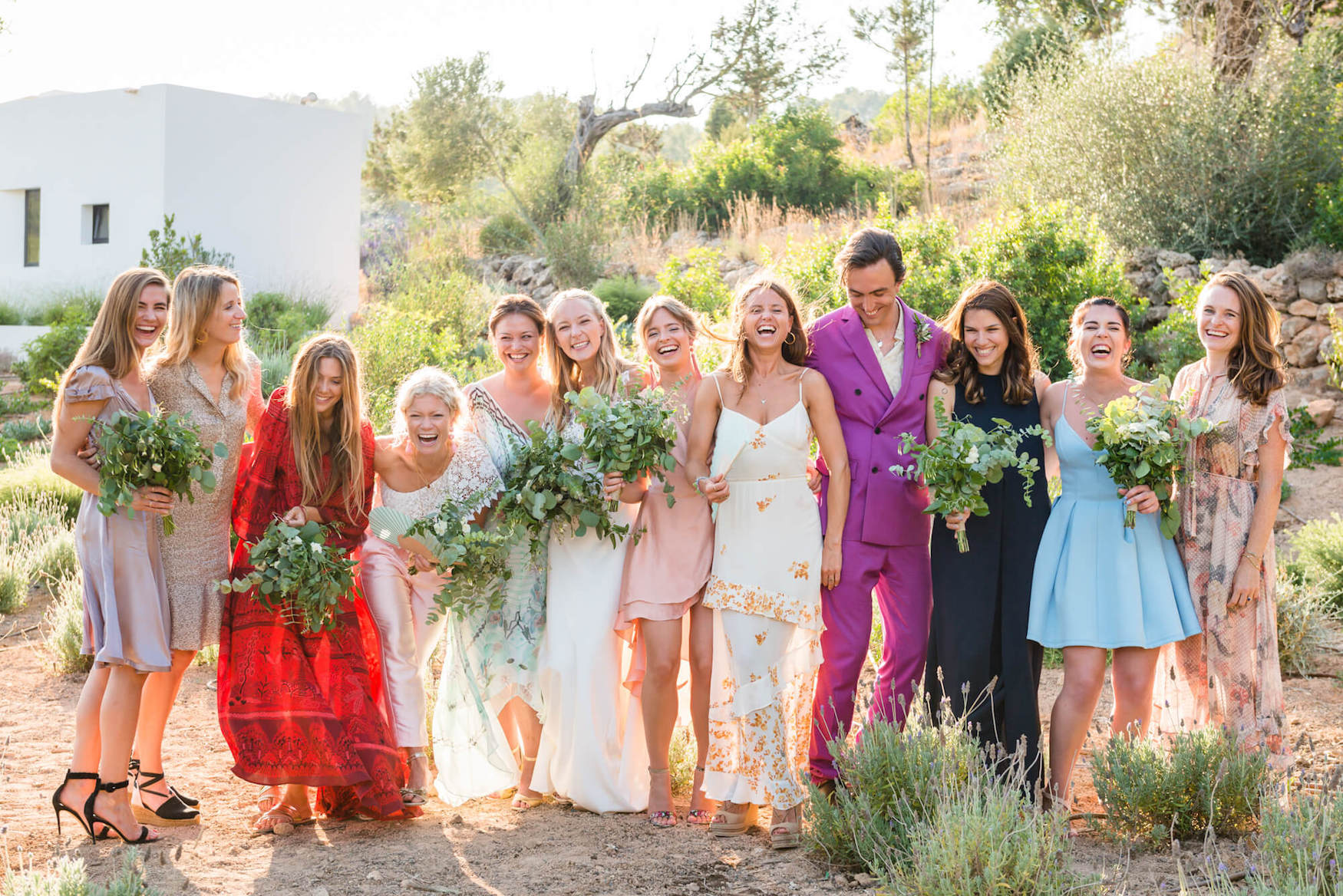 bridal party colourfull dresses outdoor country hill views cocktail hour