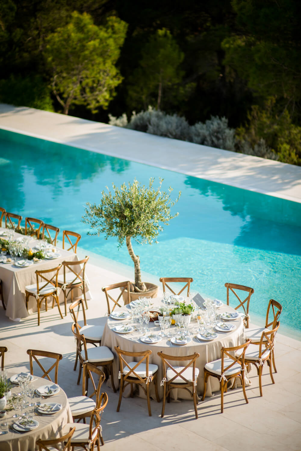 Wedding tables by the swimming pool at Casa Agua in Ibiza