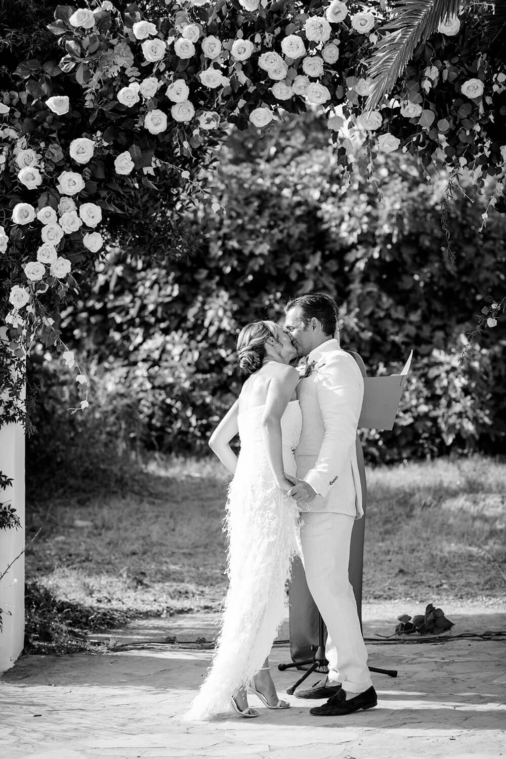 Bride and Groom Kissing at their wedding ceremony at Las cicadas Ibiza