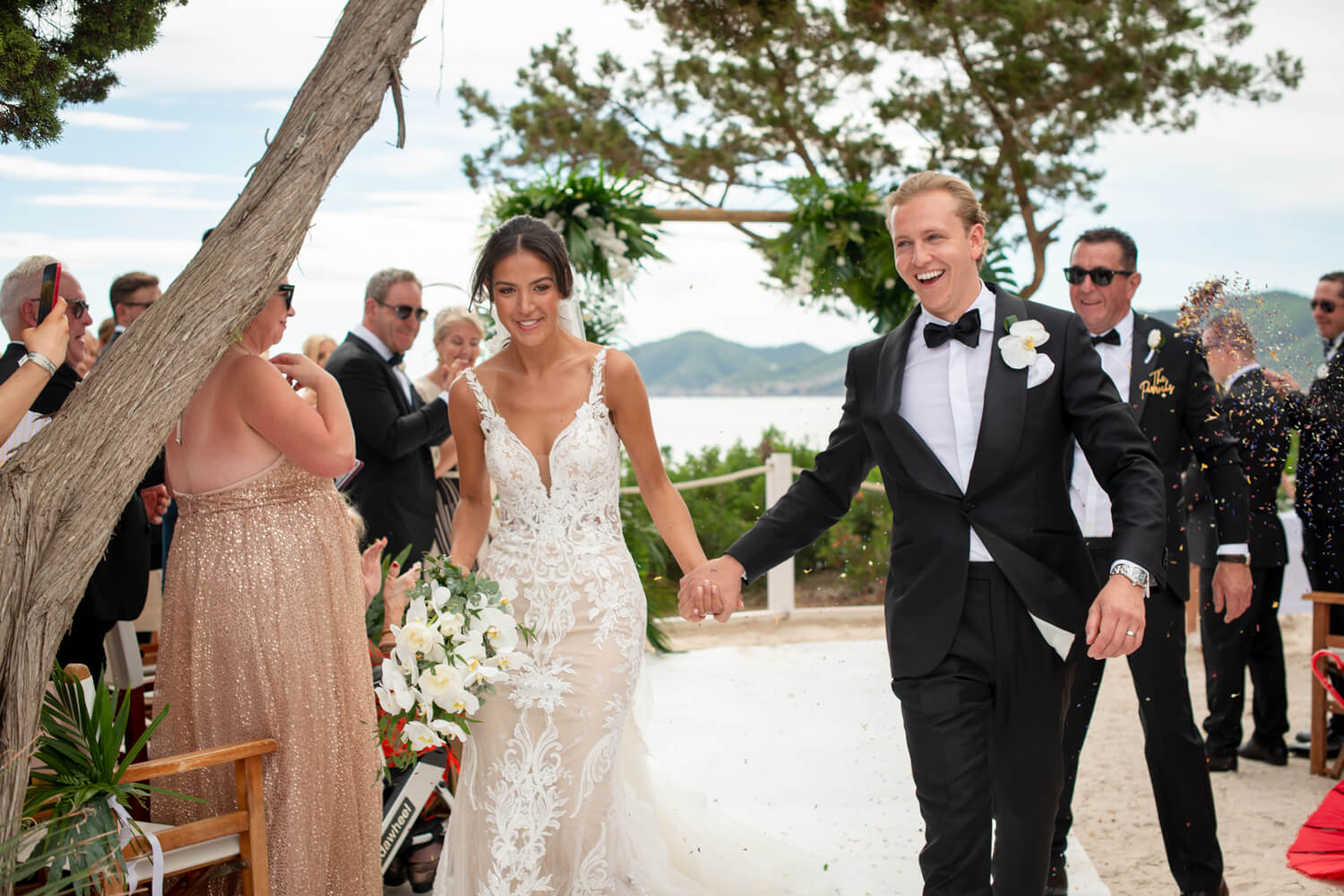 Bride and groom at Nikki beach, Ibiza just married