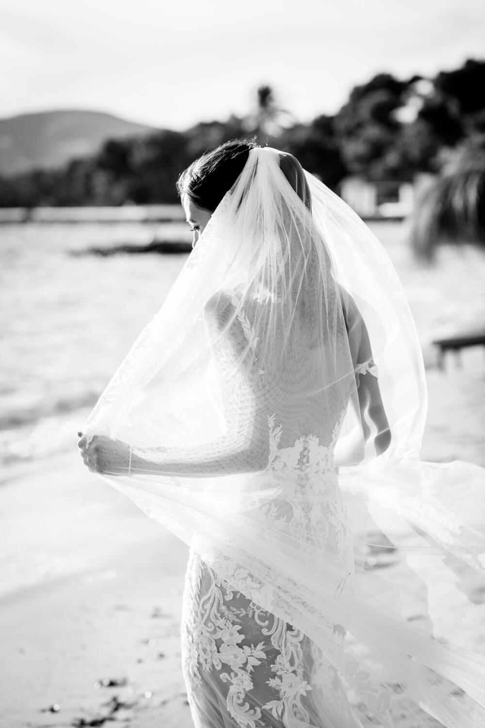 Bride on beach in Ibiza, Nikki beach