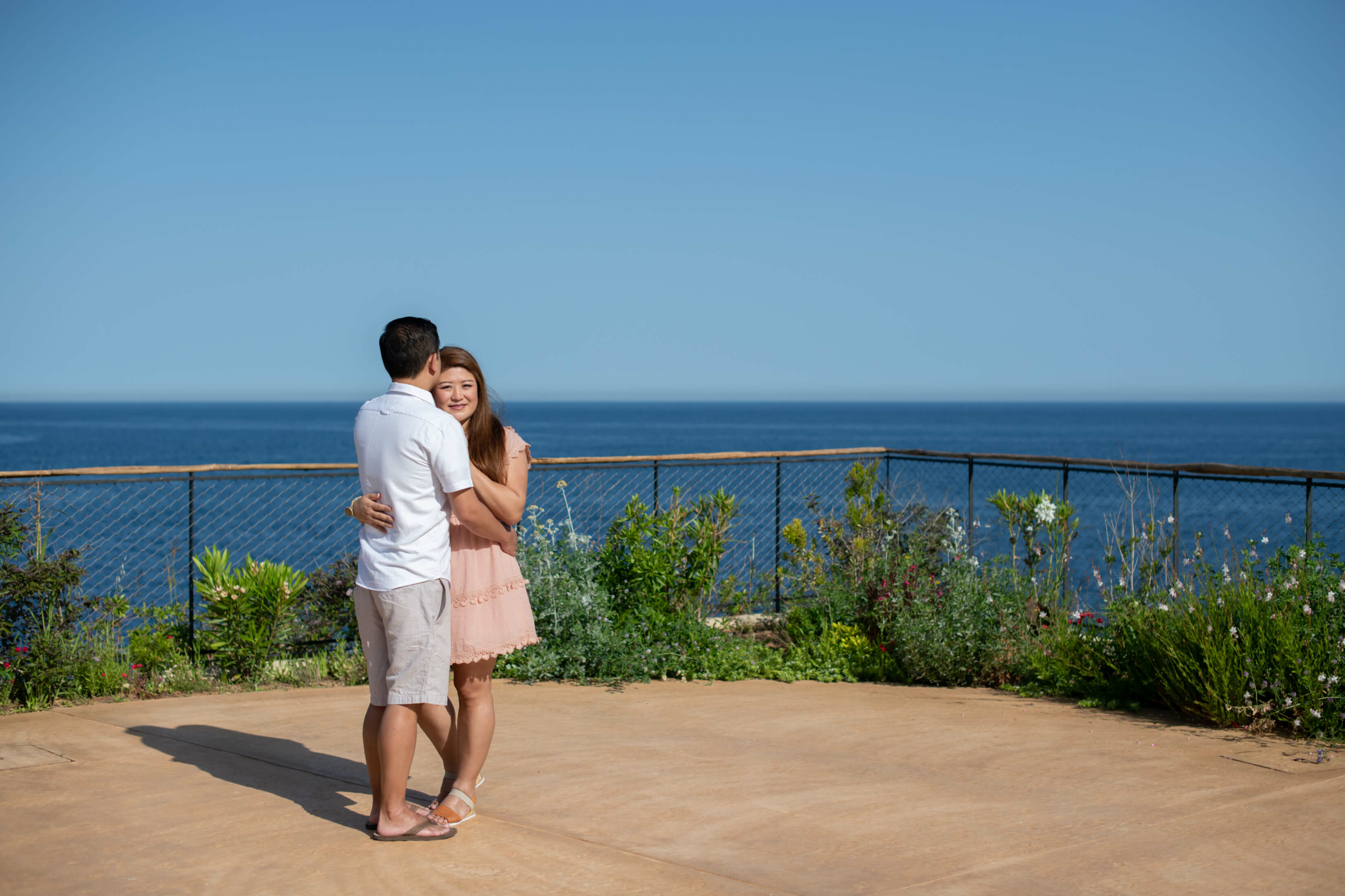 Couple in Morning light with sea view at six senses Ibiza