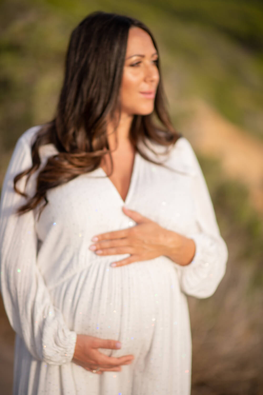 Pregnant maternity shoot overlooking Es Vedra