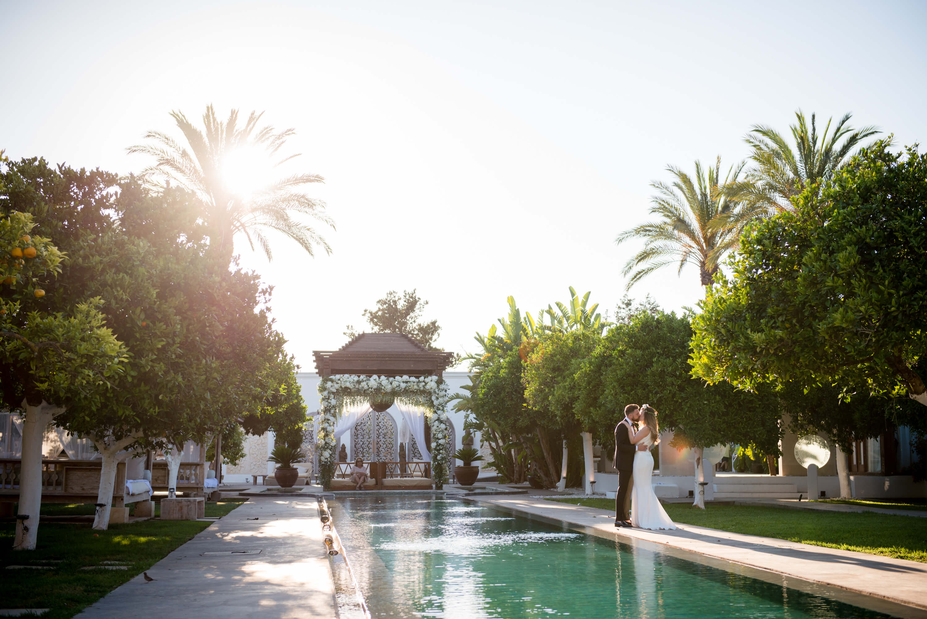 Atzaro Ibiza wedding Bride and groom by the pool