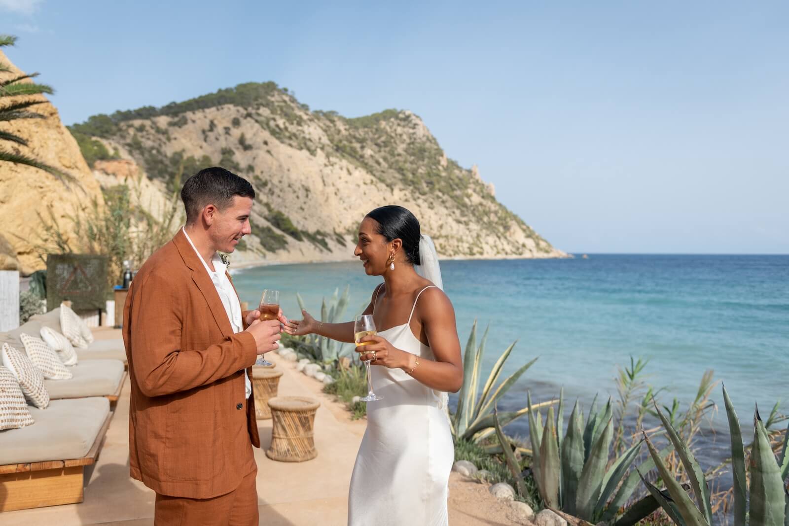 Sienna & Jackson Ibiza Wedding Amante Gypsy Westwood Ibiza Photographer5 Ibiza wedding Venue bride groom drinking champagne Amante