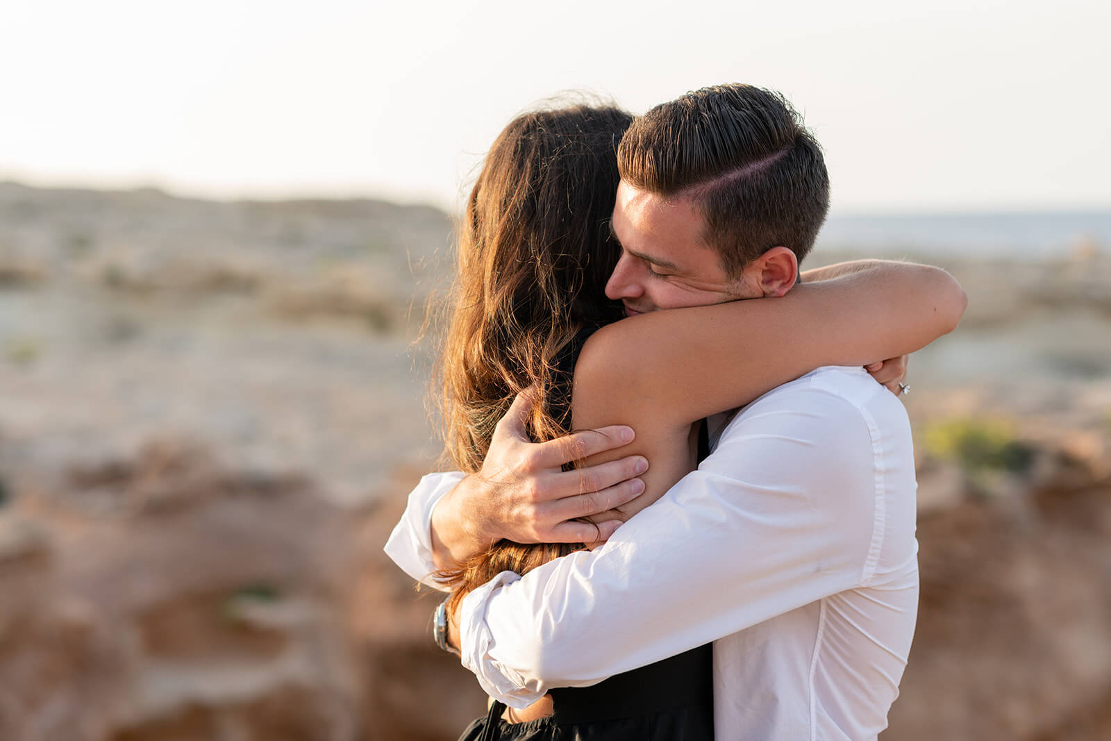 S+N-c-43_websize couple in ibiza hug after marriage proposal