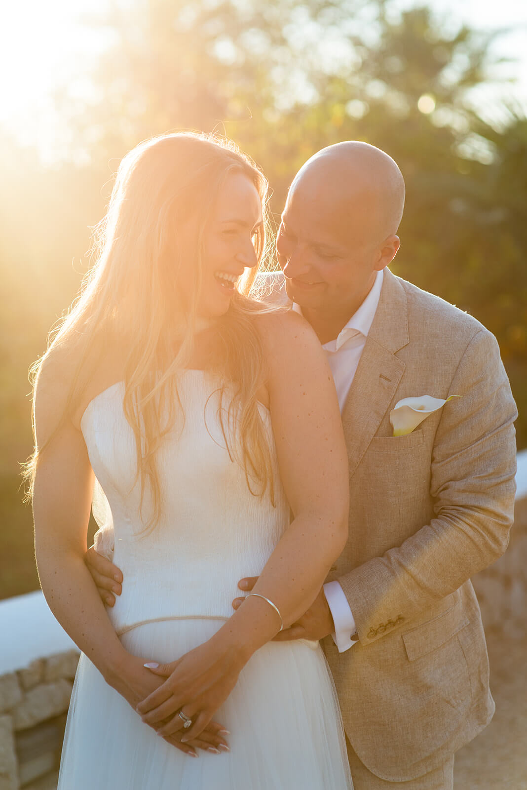 bride and groom during sunset take couple photos after wedding ceremony at Can Gall Ibiza